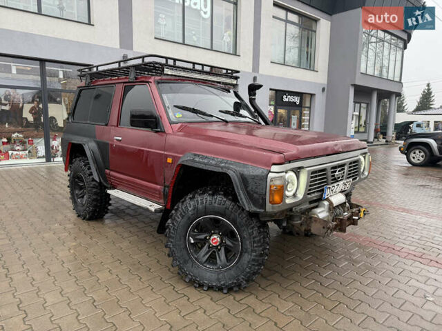 Красный Ниссан Патрол, объемом двигателя 2.8 л и пробегом 250 тыс. км за 7500 $, фото 1 на Automoto.ua