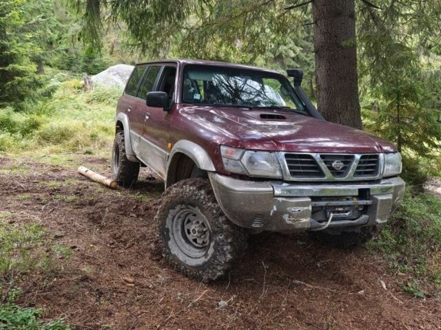 Червоний Ніссан Патрол, об'ємом двигуна 0 л та пробігом 290 тис. км за 9300 $, фото 1 на Automoto.ua