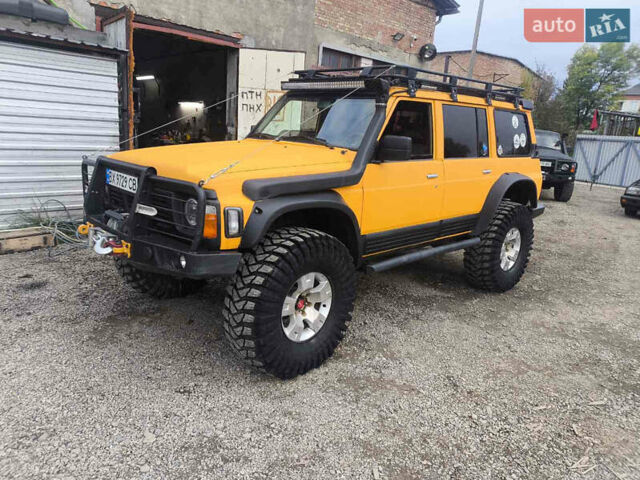 Жовтий Ніссан Патрол, об'ємом двигуна 4.2 л та пробігом 150 тис. км за 30000 $, фото 1 на Automoto.ua