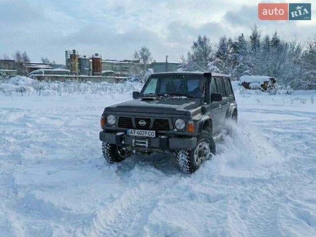 Серый Ниссан Патрол, объемом двигателя 2.8 л и пробегом 238 тыс. км за 14500 $, фото 1 на Automoto.ua