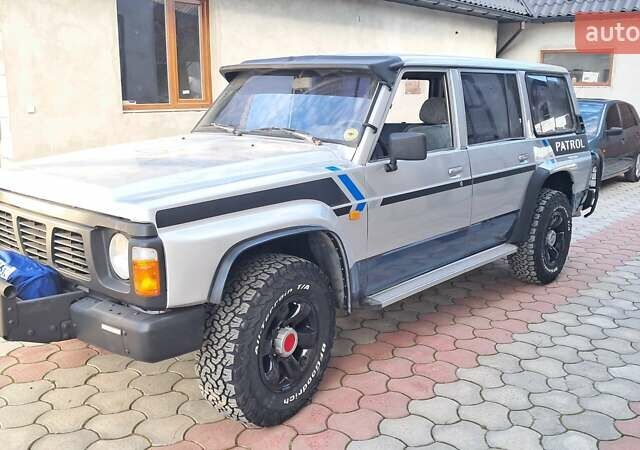 Серый Ниссан Патрол, объемом двигателя 2.8 л и пробегом 300 тыс. км за 9997 $, фото 1 на Automoto.ua