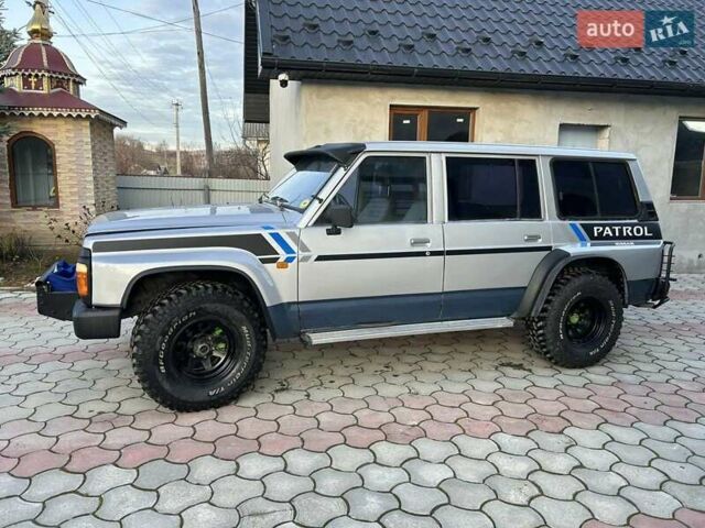 Серый Ниссан Патрол, объемом двигателя 2.8 л и пробегом 234 тыс. км за 9300 $, фото 1 на Automoto.ua