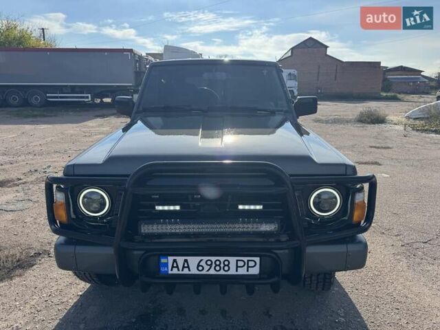 Сірий Ніссан Патрол, об'ємом двигуна 3 л та пробігом 296 тис. км за 12800 $, фото 1 на Automoto.ua