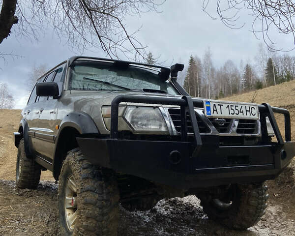 Серый Ниссан Патрол, объемом двигателя 3 л и пробегом 300 тыс. км за 15000 $, фото 1 на Automoto.ua