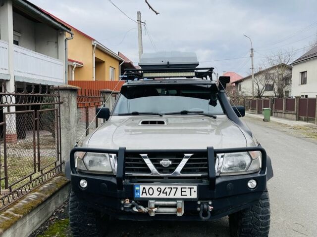 Серый Ниссан Патрол, объемом двигателя 3 л и пробегом 291 тыс. км за 16000 $, фото 1 на Automoto.ua