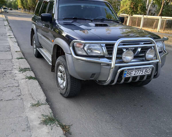 Синий Ниссан Патрол, объемом двигателя 2.95 л и пробегом 355 тыс. км за 10500 $, фото 1 на Automoto.ua