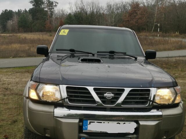 Синий Ниссан Патрол, объемом двигателя 3 л и пробегом 200 тыс. км за 8285 $, фото 1 на Automoto.ua