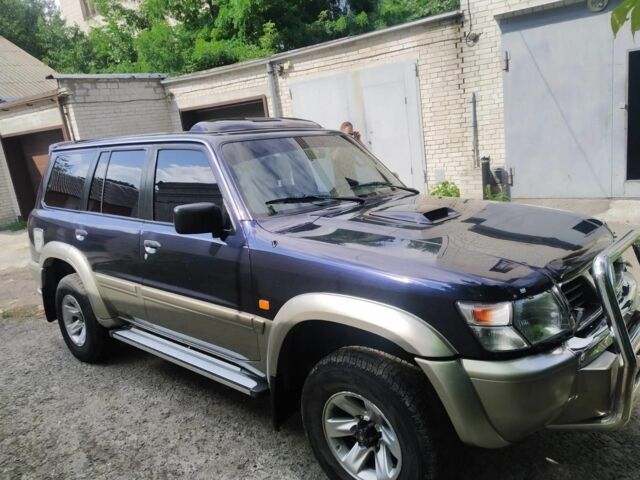 Синий Ниссан Патрол, объемом двигателя 0 л и пробегом 169 тыс. км за 13000 $, фото 1 на Automoto.ua