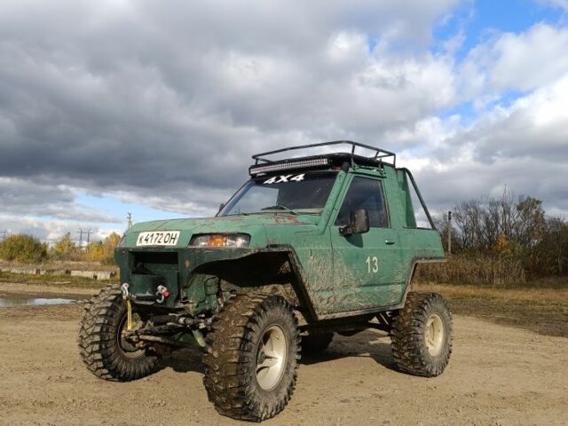 Зелений Ніссан Патрол, об'ємом двигуна 3.3 л та пробігом 250 тис. км за 4750 $, фото 1 на Automoto.ua