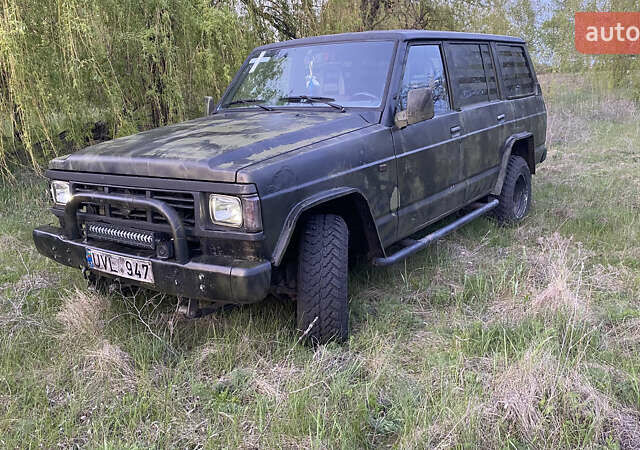 Зеленый Ниссан Патрол, объемом двигателя 2.8 л и пробегом 300 тыс. км за 4197 $, фото 1 на Automoto.ua