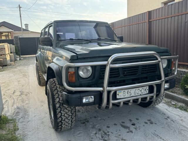 Зеленый Ниссан Патрол, объемом двигателя 2.8 л и пробегом 350 тыс. км за 5900 $, фото 1 на Automoto.ua