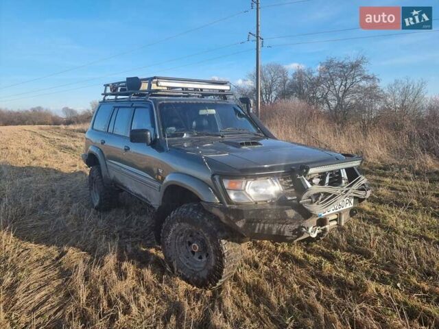 Зеленый Ниссан Патрол, объемом двигателя 2.8 л и пробегом 312 тыс. км за 21500 $, фото 1 на Automoto.ua