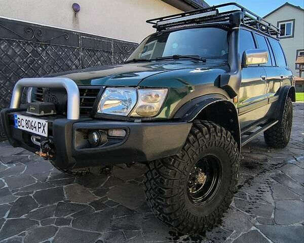 Зелений Ніссан Патрол, об'ємом двигуна 4.5 л та пробігом 250 тис. км за 18000 $, фото 1 на Automoto.ua