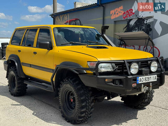 Зеленый Ниссан Патрол, объемом двигателя 4.2 л и пробегом 270 тыс. км за 26800 $, фото 1 на Automoto.ua