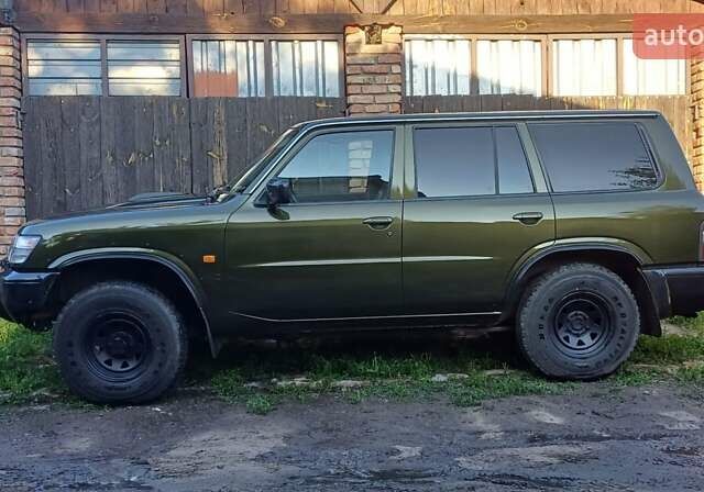 Зеленый Ниссан Патрол, объемом двигателя 2.96 л и пробегом 240 тыс. км за 24000 $, фото 1 на Automoto.ua