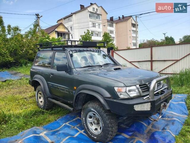 Зелений Ніссан Патрол, об'ємом двигуна 3 л та пробігом 236 тис. км за 12000 $, фото 1 на Automoto.ua