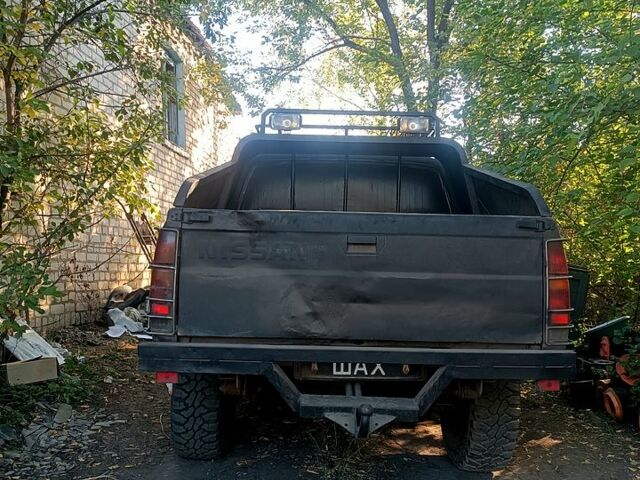 Черный Ниссан Пикап, объемом двигателя 2.5 л и пробегом 0 тыс. км за 3000 $, фото 1 на Automoto.ua