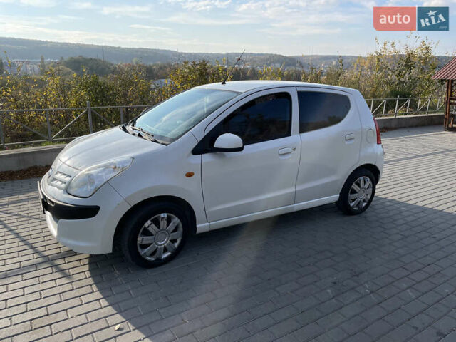 Белый Ниссан Пиксо, объемом двигателя 1 л и пробегом 206 тыс. км за 3500 $, фото 1 на Automoto.ua