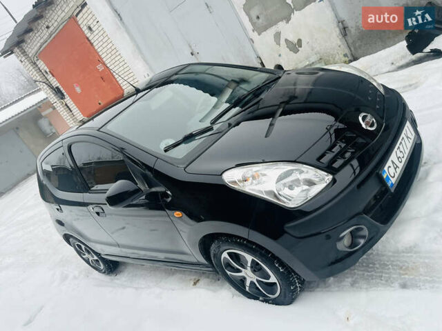 Чорний Ніссан Піксо, об'ємом двигуна 1 л та пробігом 220 тис. км за 5700 $, фото 1 на Automoto.ua