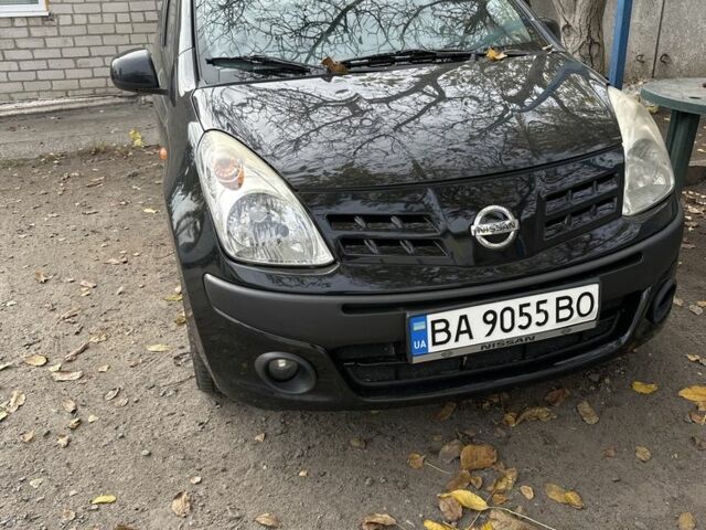 Черный Ниссан Пиксо, объемом двигателя 1 л и пробегом 150 тыс. км за 3300 $, фото 1 на Automoto.ua