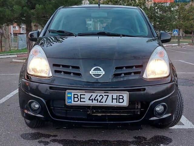 Черный Ниссан Пиксо, объемом двигателя 1 л и пробегом 49 тыс. км за 6000 $, фото 1 на Automoto.ua