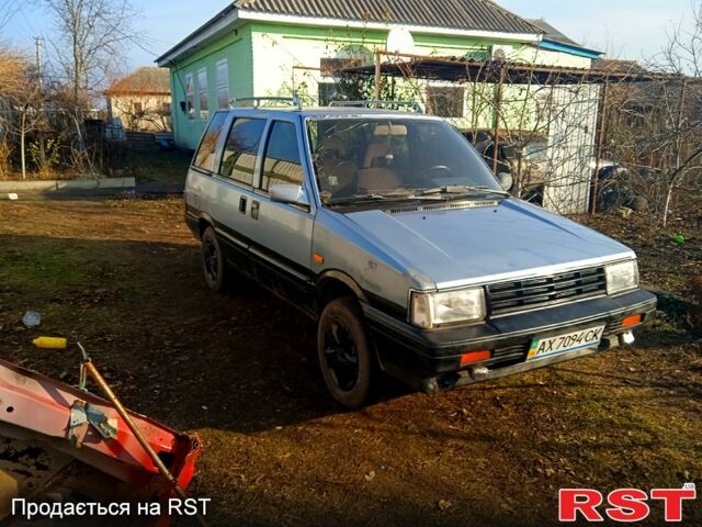 Синій Ніссан Прерія, об'ємом двигуна 2 л та пробігом 100 тис. км за 1100 $, фото 1 на Automoto.ua