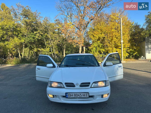 Білий Ніссан Прімера, об'ємом двигуна 2 л та пробігом 392 тис. км за 2700 $, фото 1 на Automoto.ua
