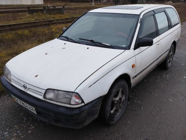 Білий Ніссан Прімера, об'ємом двигуна 2 л та пробігом 409 тис. км за 1200 $, фото 1 на Automoto.ua