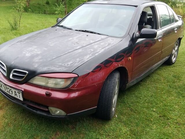 Черный Ниссан Примера, объемом двигателя 2 л и пробегом 288 тыс. км за 1310 $, фото 1 на Automoto.ua