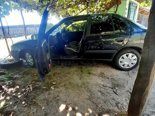 Черный Ниссан Примера, объемом двигателя 2 л и пробегом 0 тыс. км за 970 $, фото 1 на Automoto.ua