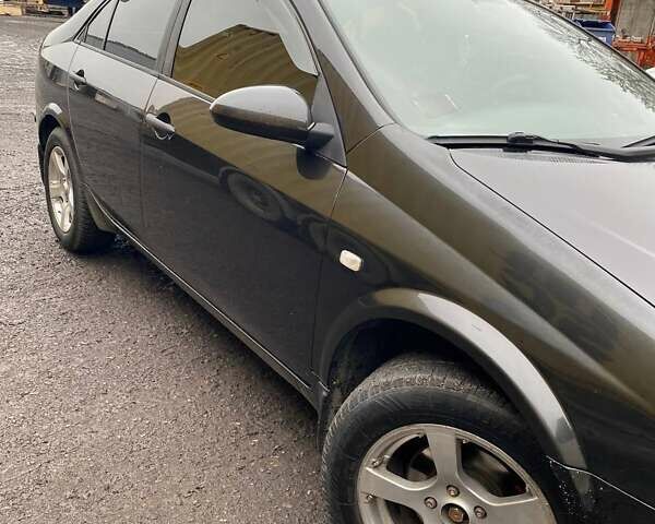 Черный Ниссан Примера, объемом двигателя 1.77 л и пробегом 241 тыс. км за 3600 $, фото 1 на Automoto.ua