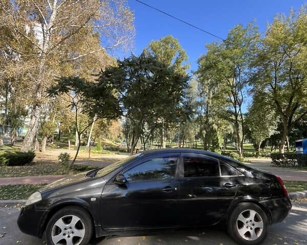 Чорний Ніссан Прімера, об'ємом двигуна 1.8 л та пробігом 270 тис. км за 2500 $, фото 1 на Automoto.ua