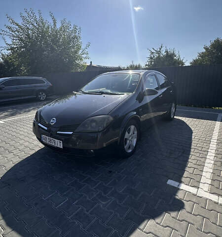 Черный Ниссан Примера, объемом двигателя 2 л и пробегом 244 тыс. км за 4999 $, фото 1 на Automoto.ua