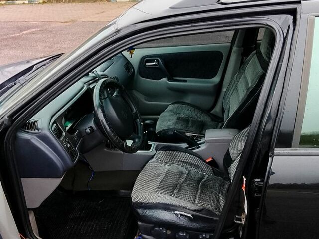 Чорний Ніссан Прімера, об'ємом двигуна 1.8 л та пробігом 290 тис. км за 2000 $, фото 1 на Automoto.ua