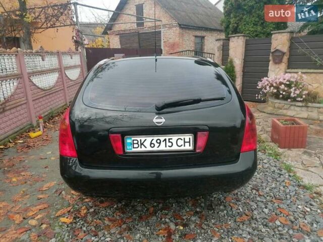 Черный Ниссан Примера, объемом двигателя 1.9 л и пробегом 200 тыс. км за 5000 $, фото 1 на Automoto.ua