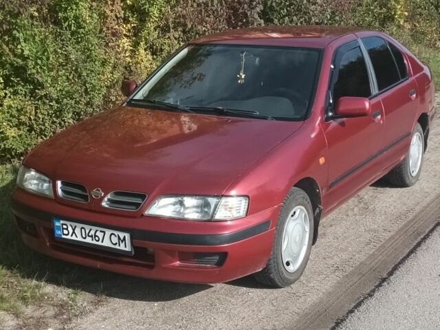 Красный Ниссан Примера, объемом двигателя 1.6 л и пробегом 332 тыс. км за 2600 $, фото 1 на Automoto.ua