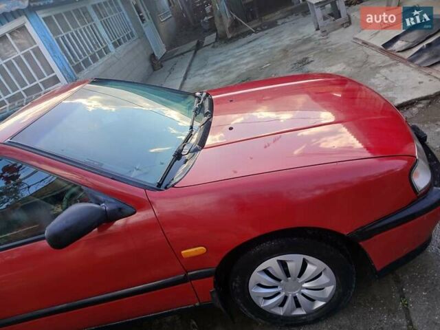 Червоний Ніссан Прімера, об'ємом двигуна 2 л та пробігом 330 тис. км за 2000 $, фото 1 на Automoto.ua