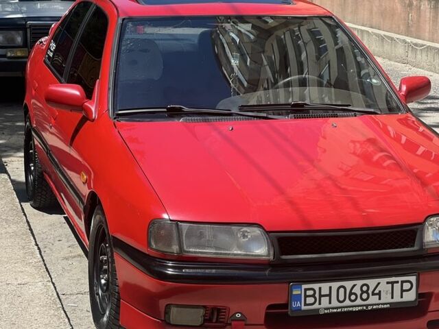 Червоний Ніссан Прімера, об'ємом двигуна 2 л та пробігом 430 тис. км за 2702 $, фото 1 на Automoto.ua