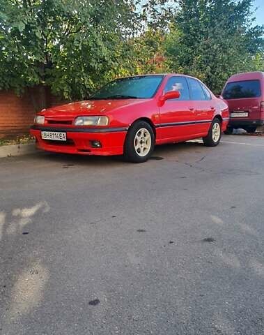 Красный Ниссан Примера, объемом двигателя 2 л и пробегом 250 тыс. км за 3000 $, фото 1 на Automoto.ua
