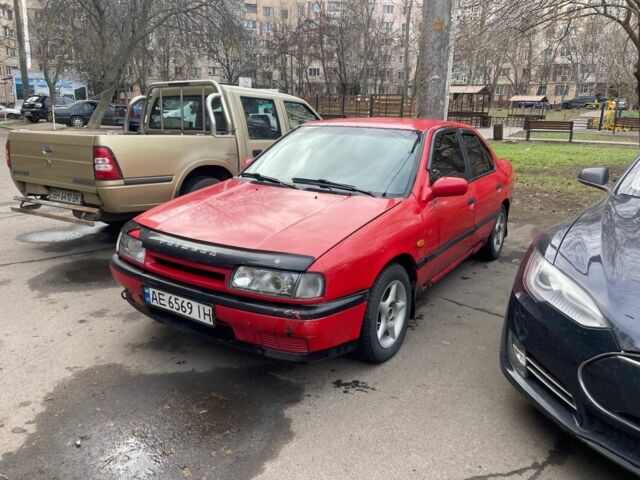 Червоний Ніссан Прімера, об'ємом двигуна 2 л та пробігом 255 тис. км за 750 $, фото 1 на Automoto.ua