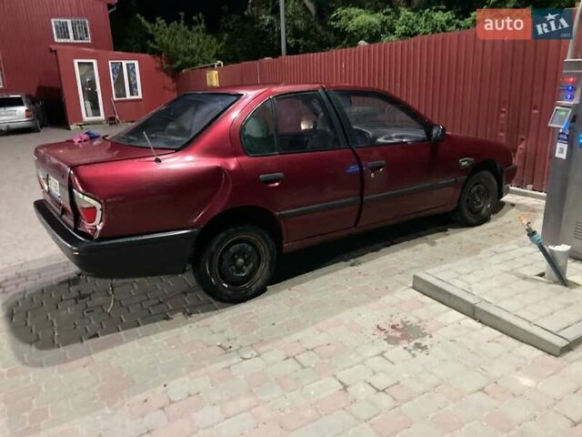 Красный Ниссан Примера, объемом двигателя 1.6 л и пробегом 300 тыс. км за 600 $, фото 1 на Automoto.ua