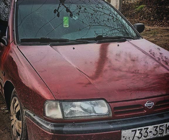 Красный Ниссан Примера, объемом двигателя 1.6 л и пробегом 362 тыс. км за 1061 $, фото 1 на Automoto.ua
