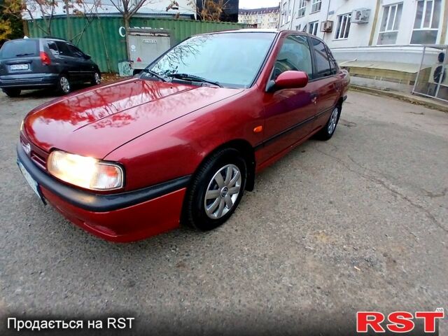 Красный Ниссан Примера, объемом двигателя 1.6 л и пробегом 250 тыс. км за 2800 $, фото 1 на Automoto.ua