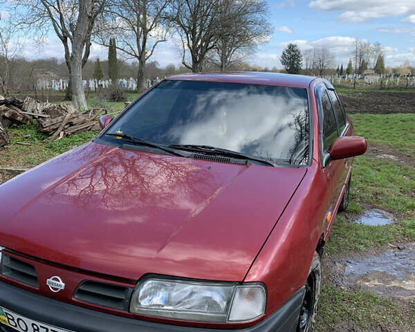 Красный Ниссан Примера, объемом двигателя 2 л и пробегом 329 тыс. км за 1800 $, фото 1 на Automoto.ua