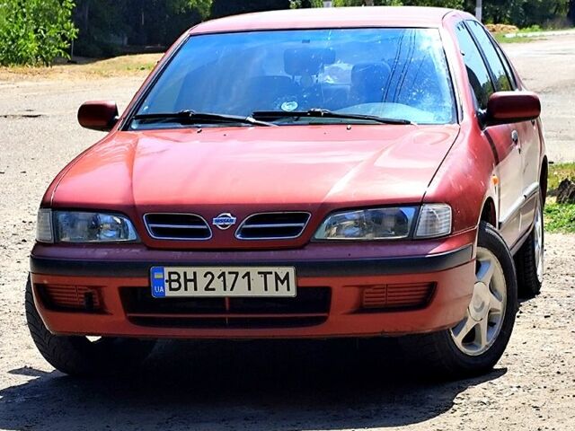 Красный Ниссан Примера, объемом двигателя 1.6 л и пробегом 249 тыс. км за 3000 $, фото 1 на Automoto.ua