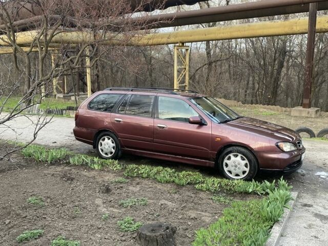 Красный Ниссан Примера, объемом двигателя 2 л и пробегом 500 тыс. км за 1500 $, фото 1 на Automoto.ua