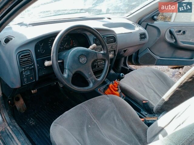 Сірий Ніссан Прімера, об'ємом двигуна 2 л та пробігом 350 тис. км за 1200 $, фото 1 на Automoto.ua