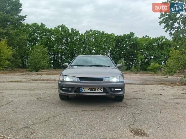 Сірий Ніссан Прімера, об'ємом двигуна 2 л та пробігом 356 тис. км за 1400 $, фото 1 на Automoto.ua