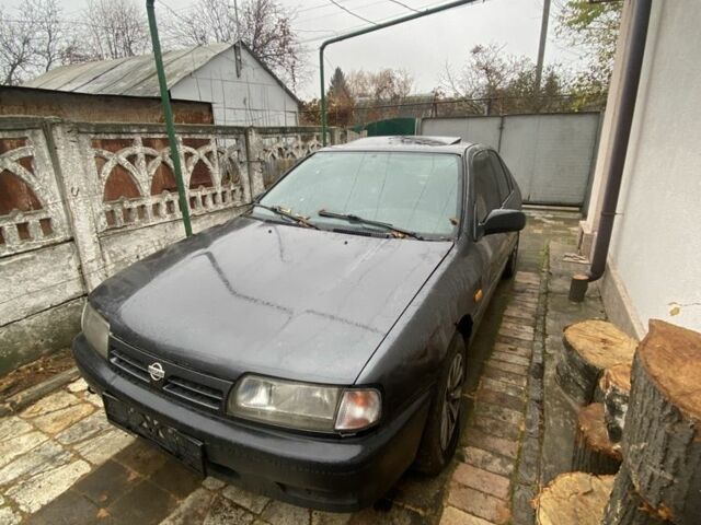 Серый Ниссан Примера, объемом двигателя 2 л и пробегом 198 тыс. км за 476 $, фото 1 на Automoto.ua