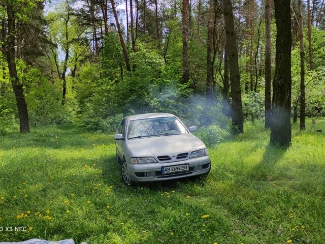 Серый Ниссан Примера, объемом двигателя 2 л и пробегом 370 тыс. км за 2300 $, фото 1 на Automoto.ua